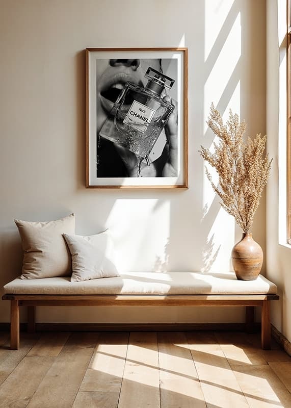 Black and white poster with a sensual photograph of a woman holding a Chanel No5 perfume bottle-12
