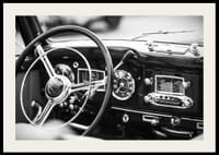 Black and white poster with a photograph on the dashboard of a classic car-2