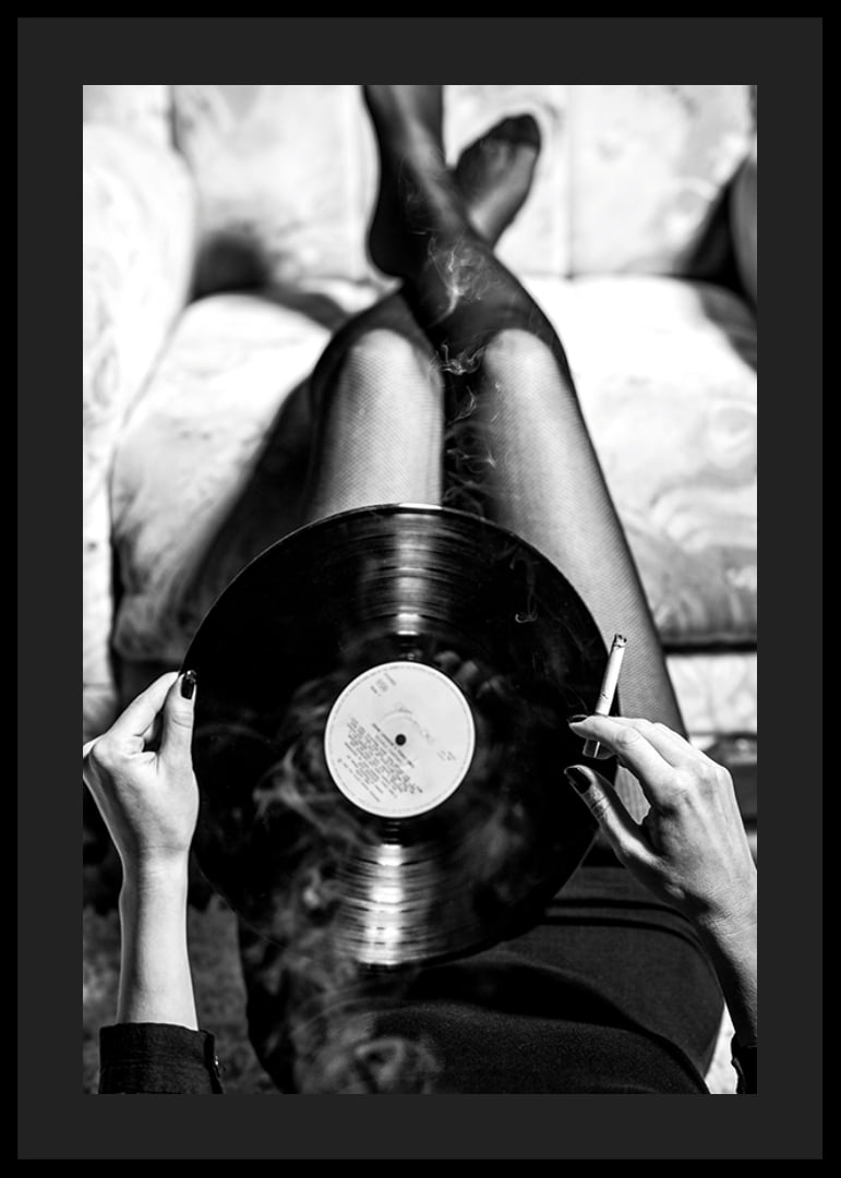 Poster with a vintage black and white photograph of a woman holding a vinyl record-12