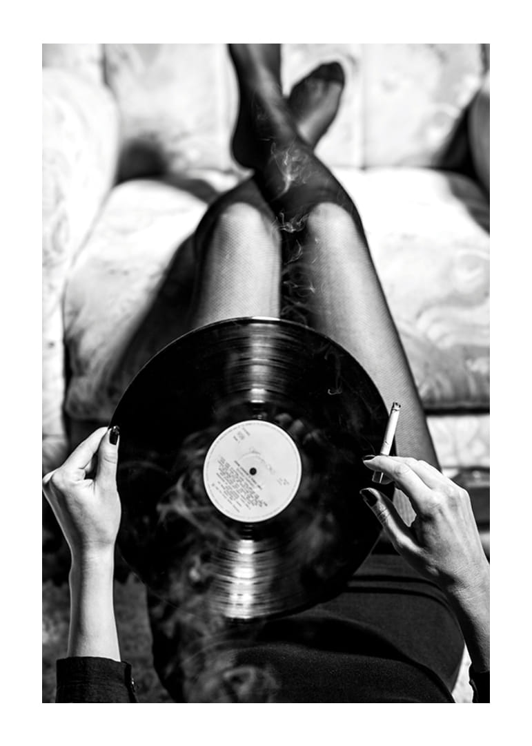Poster with a vintage black and white photograph of a woman holding a vinyl record-12