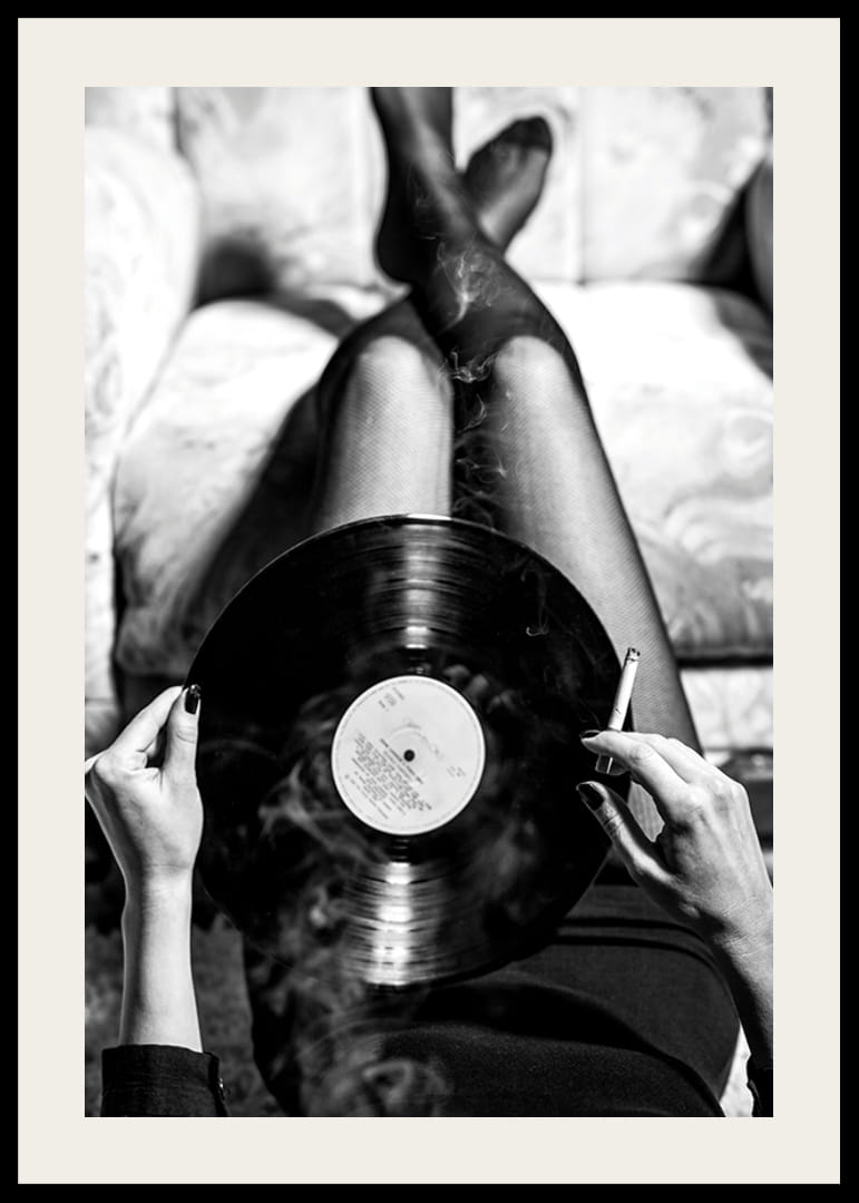 Poster with a vintage black and white photograph of a woman holding a vinyl record-12