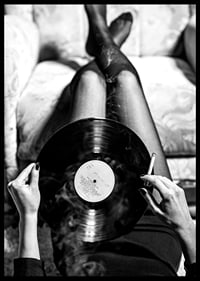 Poster with a vintage black and white photograph of a woman holding a vinyl record-6