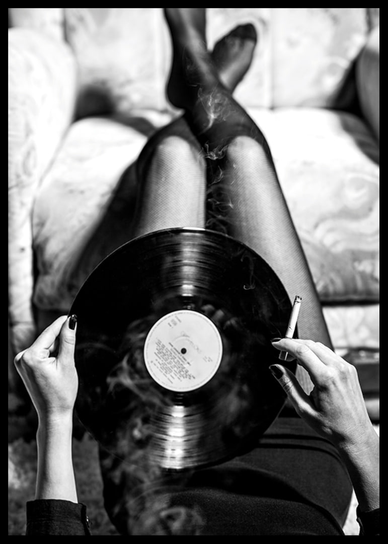 Poster with a vintage black and white photograph of a woman holding a vinyl record-12