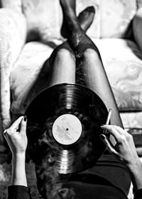 Poster with a vintage black and white photograph of a woman holding a vinyl record-7