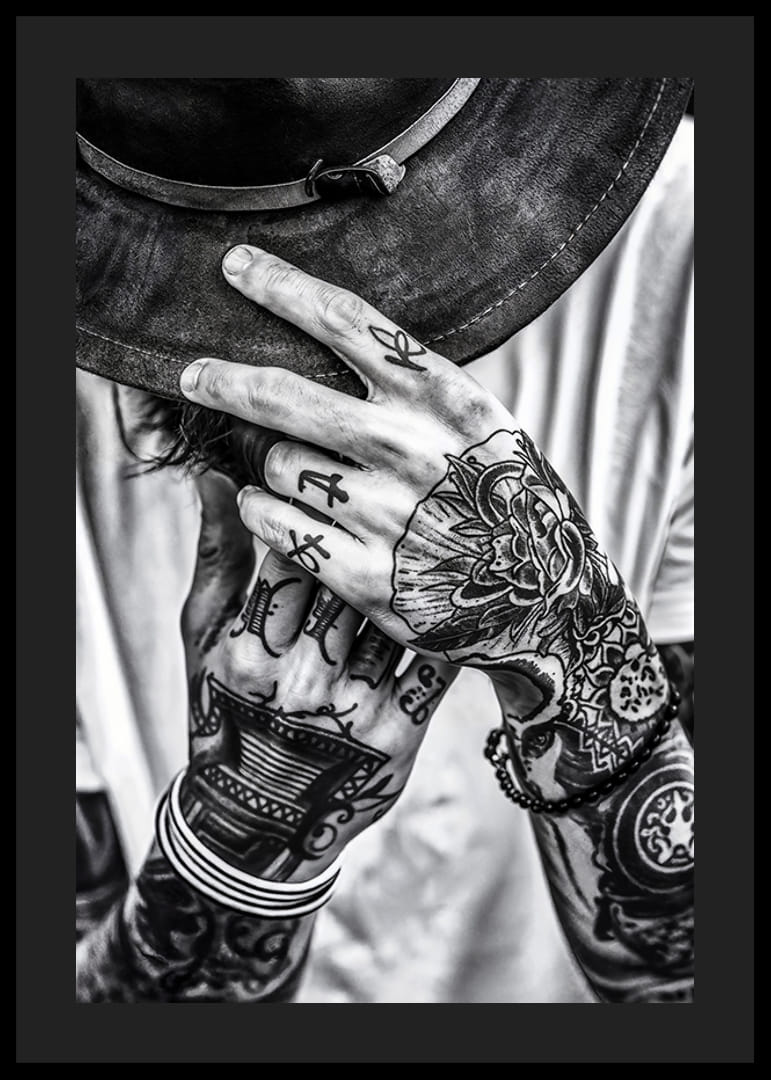Poster from the photo art category with a black and white photograph of a man with tattooed hands-12