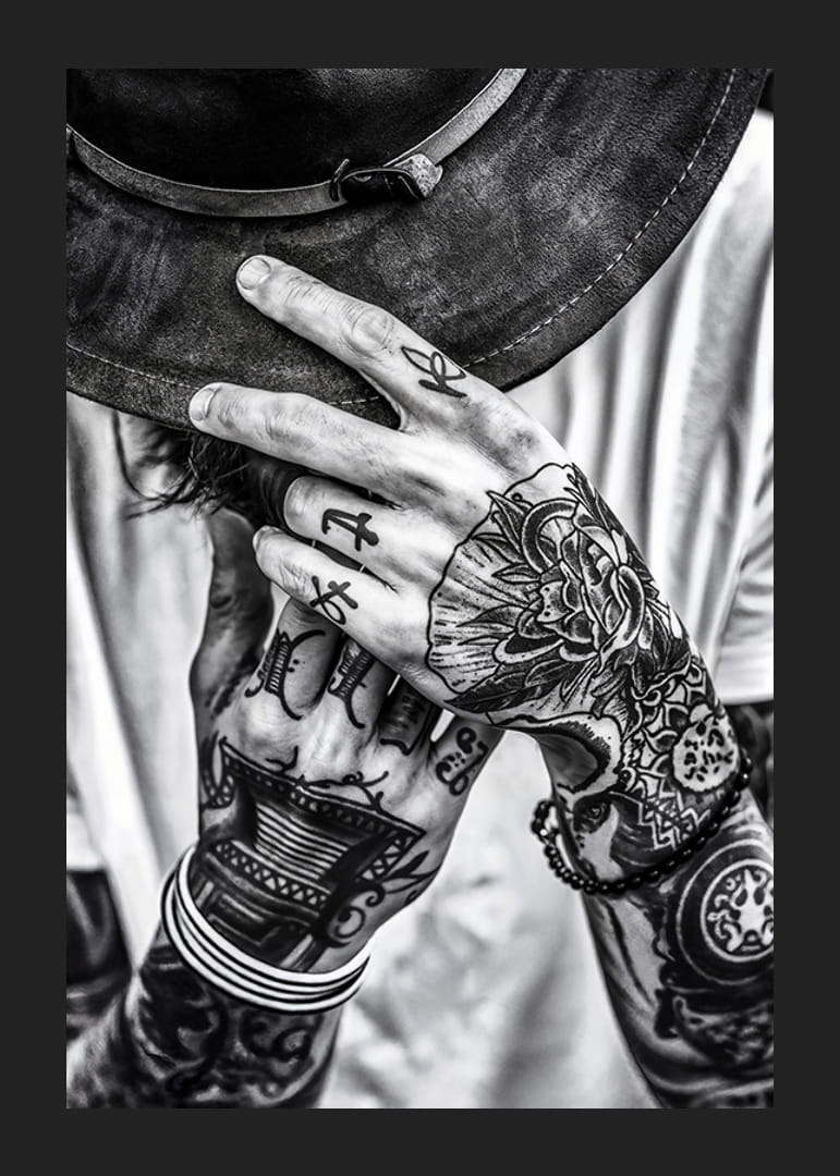 Poster from the photo art category with a black and white photograph of a man with tattooed hands-12