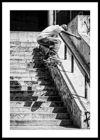 Black and white poster with a photograph of a skateboarder jumping down a flight of stairs-0