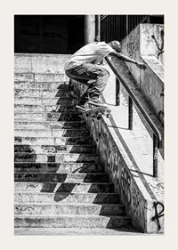 Black and white poster with a photograph of a skateboarder jumping down a flight of stairs-3
