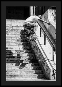 Black and white poster with a photograph of a skateboarder jumping down a flight of stairs-4