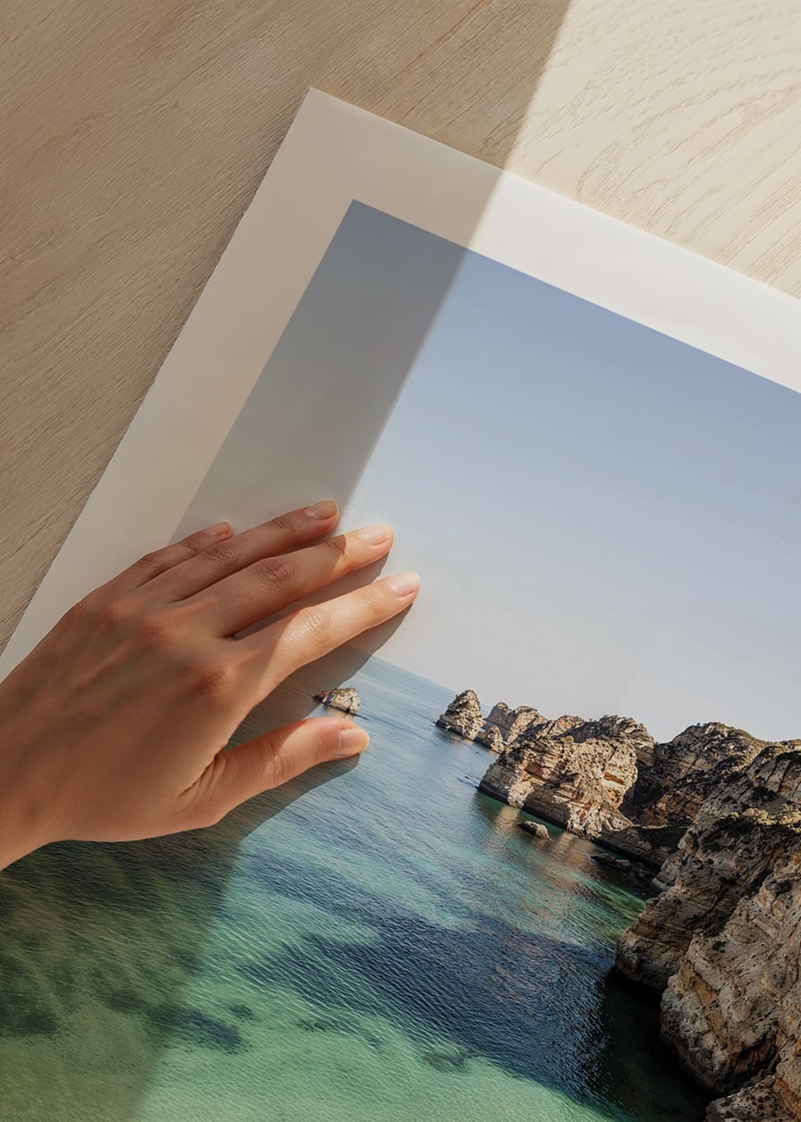 Poster with an image of a deserted beach and a crystal clear sea by a cliff-12