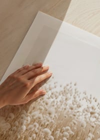 Poster with an image of a rolling field in earthy tones-9