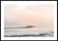 Poster with a photograph of a lone surfer at sea among the waves-0