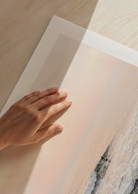 Poster with a photograph of a lone surfer at sea among the waves-9