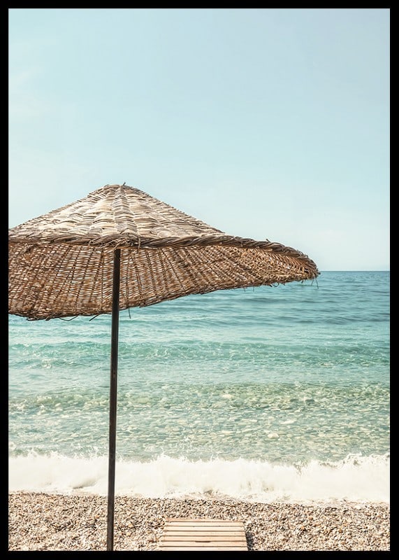 Poster with a photograph of a beautiful parasol by a beach-12
