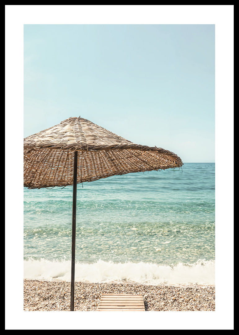 Poster with a photograph of a beautiful parasol by a beach-12