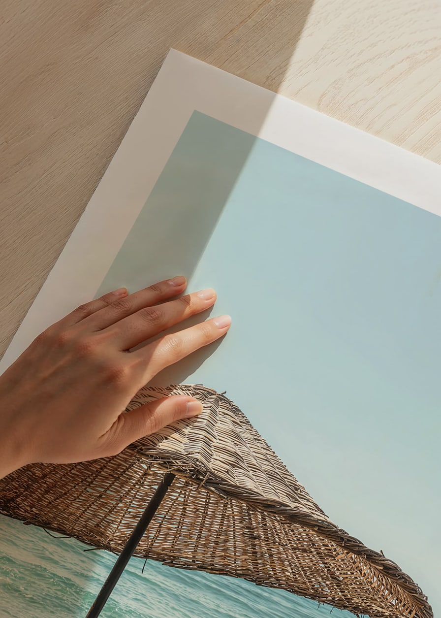 Poster with a photograph of a beautiful parasol by a beach-12