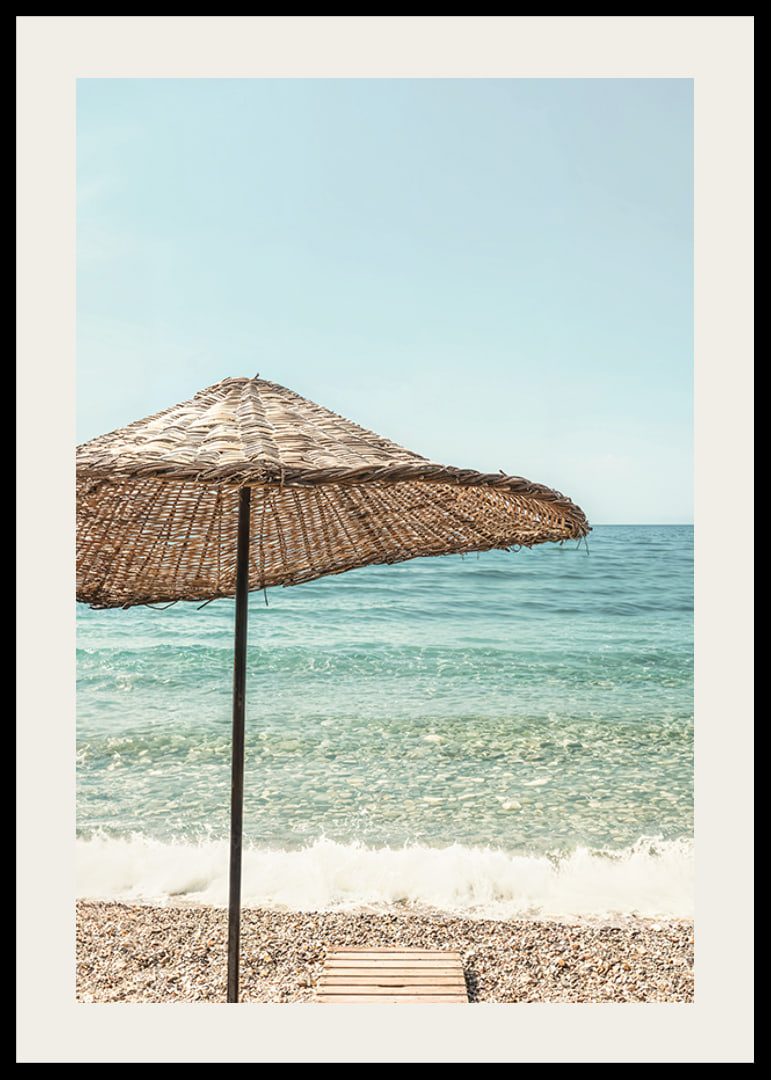Poster with a photograph of a beautiful parasol by a beach-12