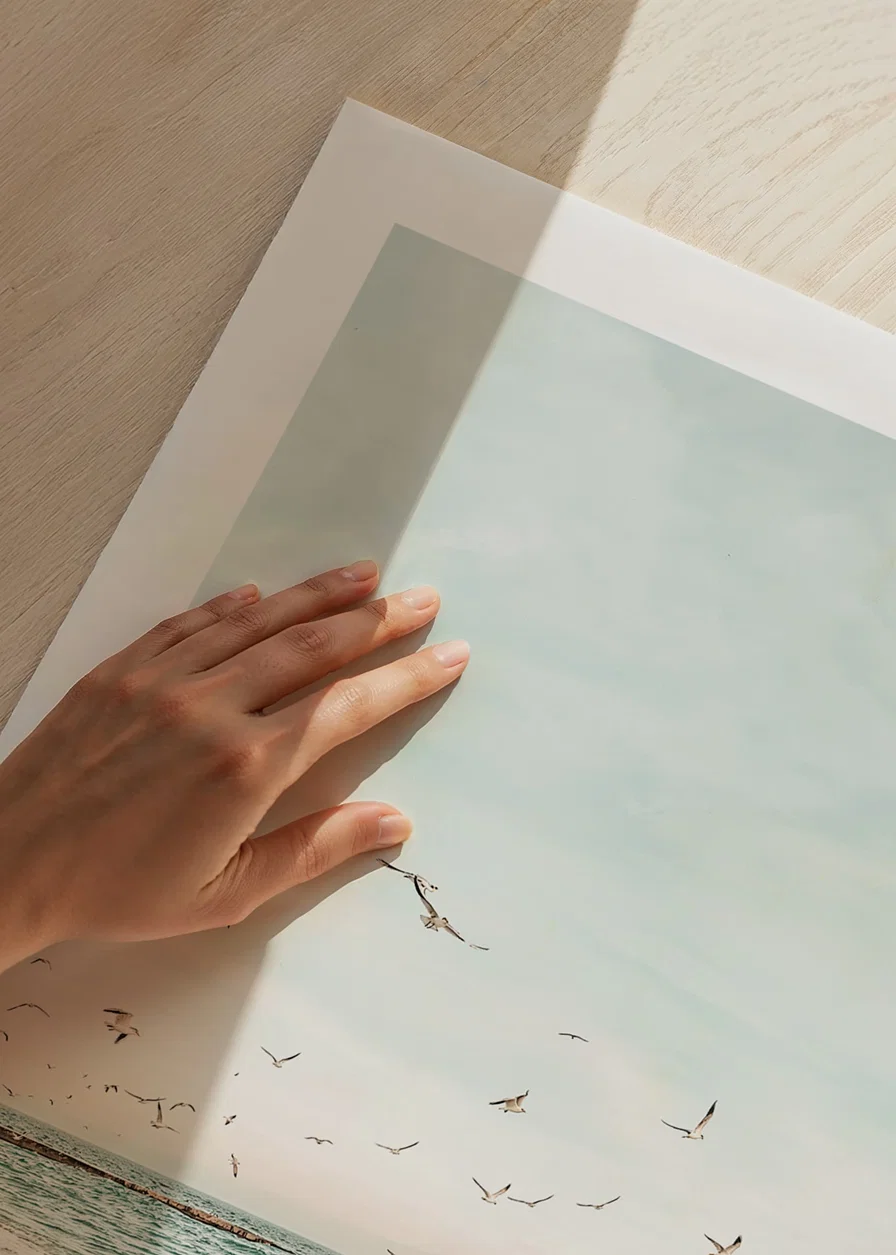 Poster with a photograph of seagulls flying over a beach-12