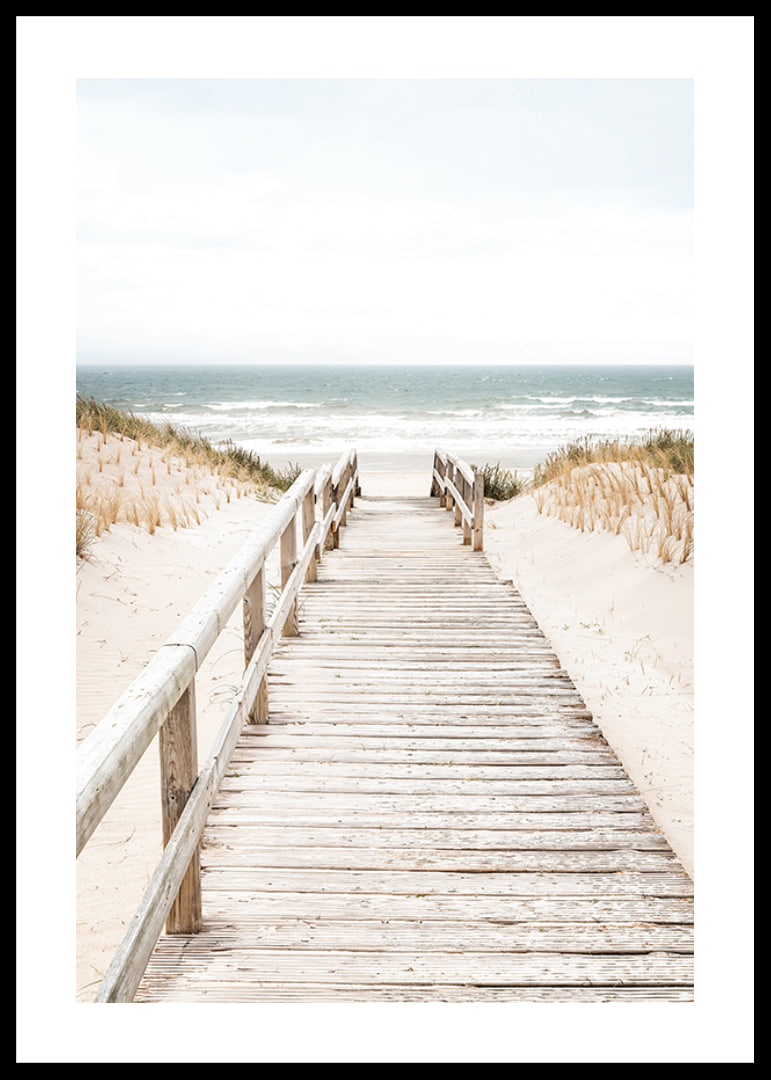 Poster with a photograph on a wooden plank among sand dunes with the sea in the background-12