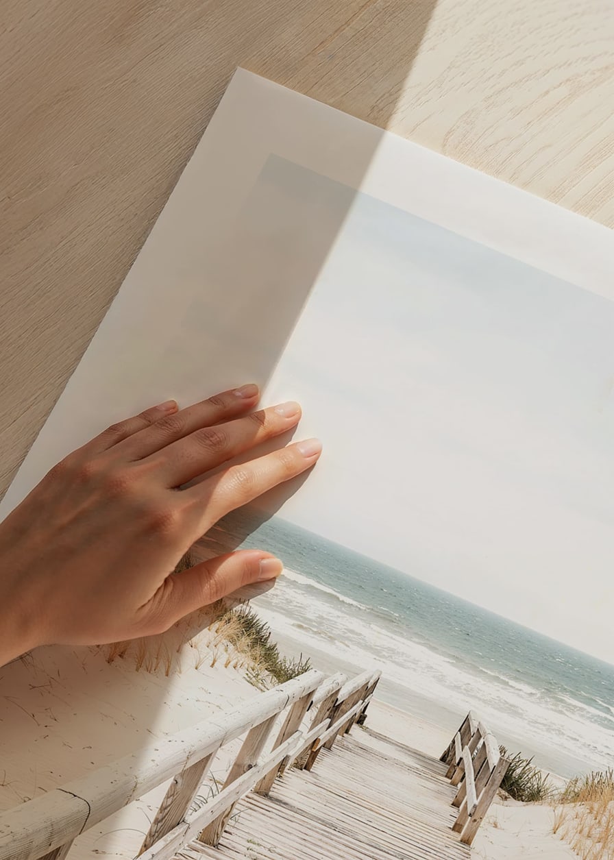 Poster with a photograph on a wooden plank among sand dunes with the sea in the background-12