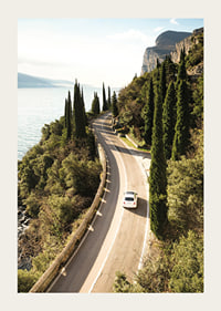 Poster with a photograph of a winding road on a coastline-3
