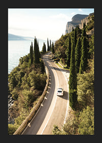 Poster with a photograph of a winding road on a coastline-5