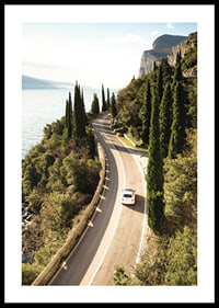 Poster with a photograph of a winding road on a coastline-0