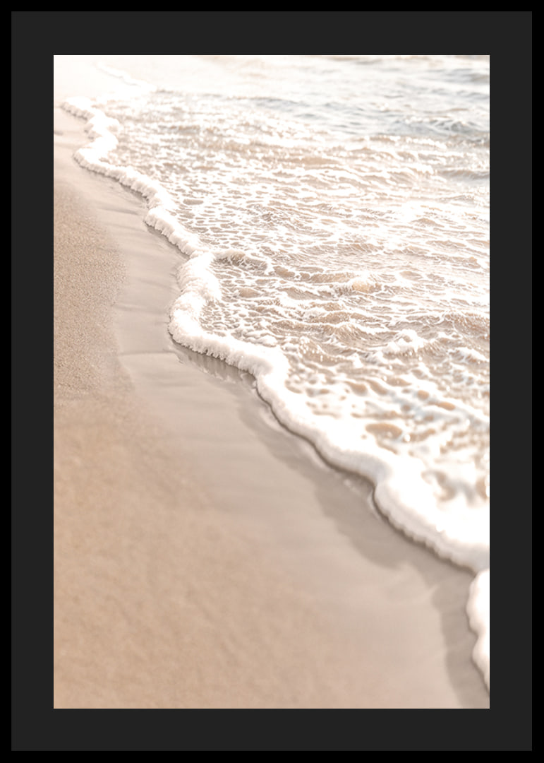 Poster with a photograph that captures the soft waves of the sea rolling in over the golden sand.-12