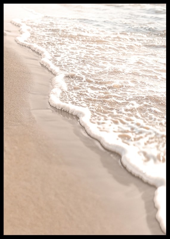 Poster with a photograph that captures the soft waves of the sea rolling in over the golden sand.-12