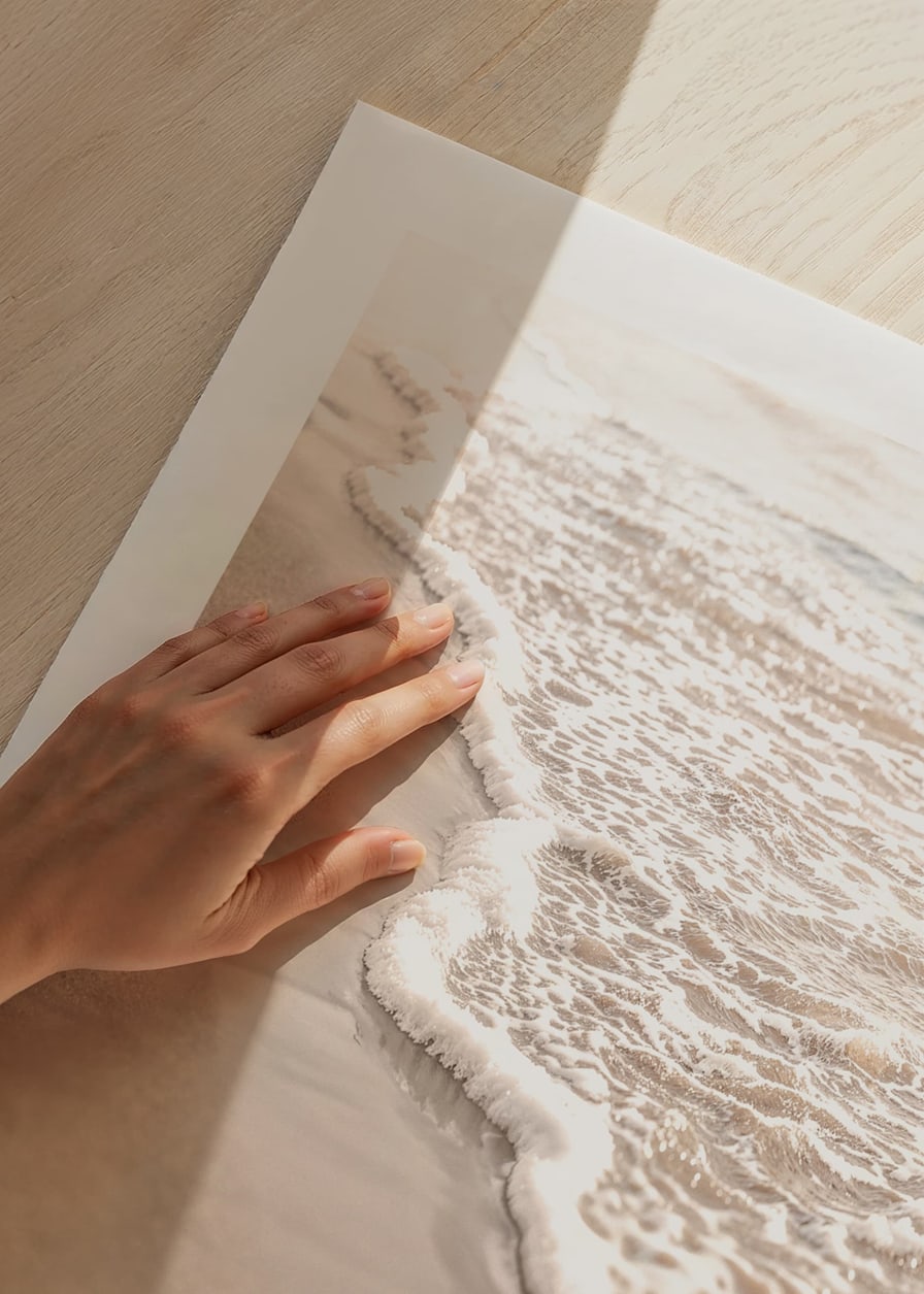 Poster with a photograph that captures the soft waves of the sea rolling in over the golden sand.-12