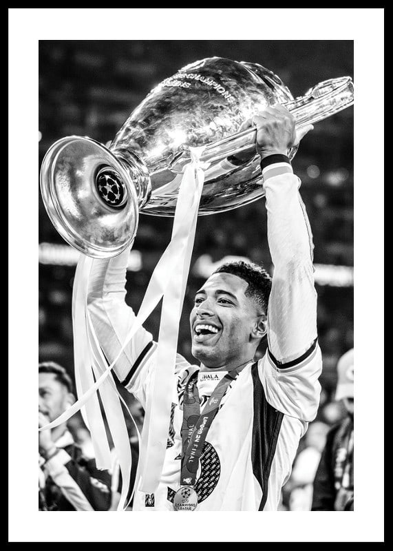 Jude Bellingham lifts the trophy after winning the champions league 2024-12