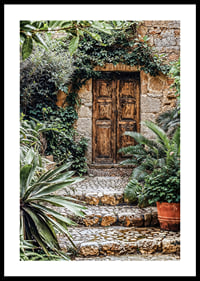Poster of a weathered wooden gate surrounded by lush greenery-0