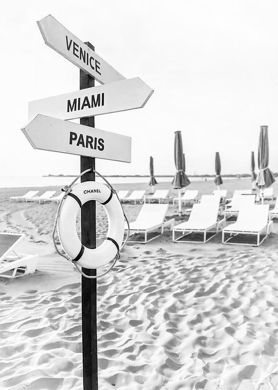 Black and white poster with a sign of luxury destinations-12