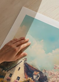 En poster med en lantlig stuga omgiven av blommande träd och solig våridyll-9