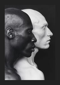 Poster with a photograph of a black and a white man symbolizing unity and difference-1