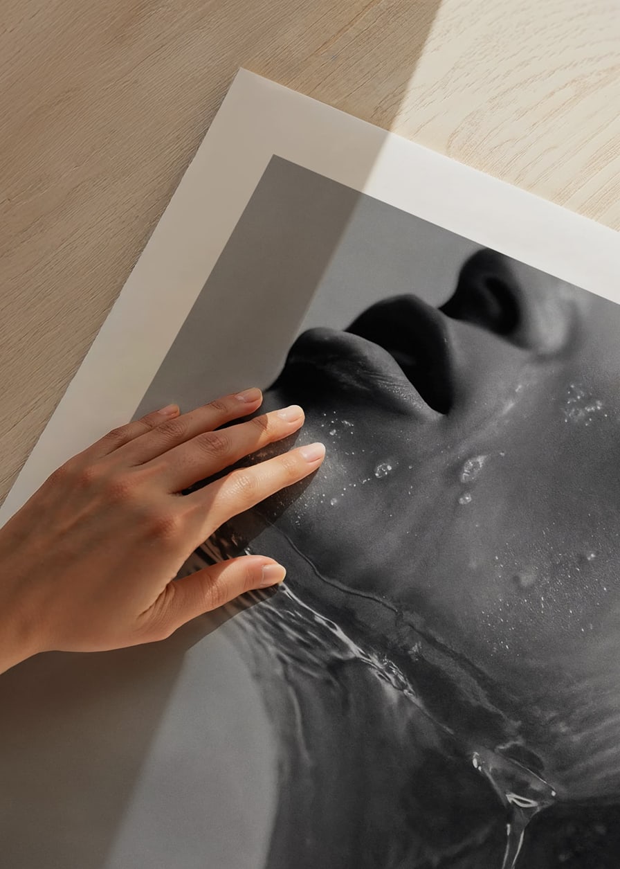Black and white poster with a sensual photograph of a model with running water-12