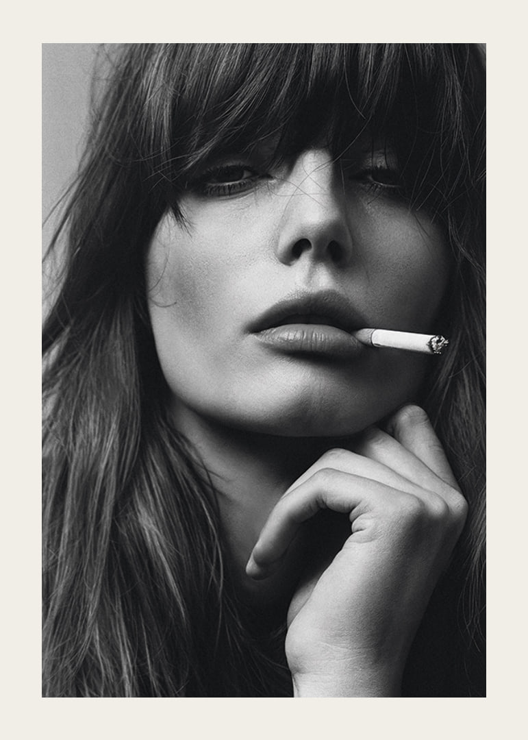 Black and white poster with a photograph of a young model with attitude-12