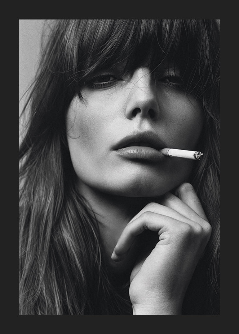 Black and white poster with a photograph of a young model with attitude-12