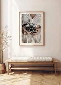 Poster with a photograph of a camera that captures a timeless sense of nostalgia-8