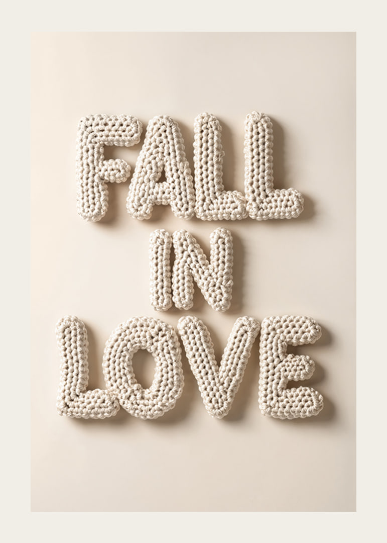 Poster with the text "Fall in love" written in crocheted letters-12