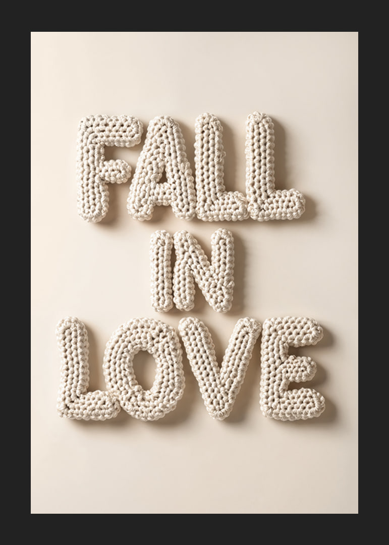 Poster with the text "Fall in love" written in crocheted letters-12
