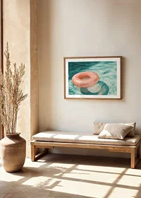 A poster featuring a soft pink-toned swim ring floating on crystal clear water-8