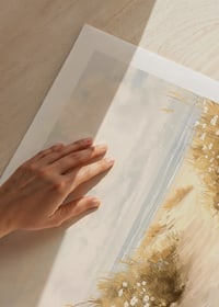 A poster of a sandy path leading through blooming dunes towards the sparkling sea-9