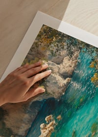A poster of a pristine paradise beach with crystal clear turquoise water and lush greenery-9