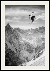Poster where a skier goes down the mountain-2