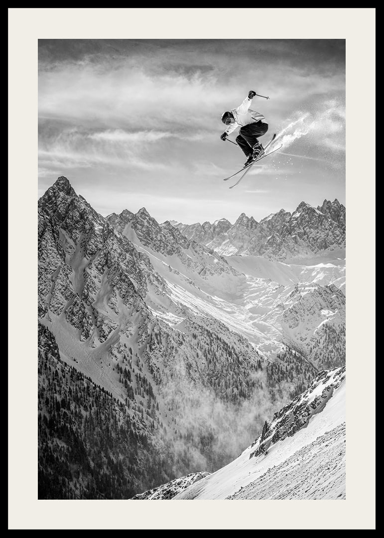 Poster where a skier goes down the mountain-12