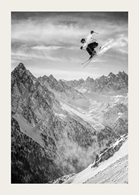 Poster where a skier goes down the mountain-3