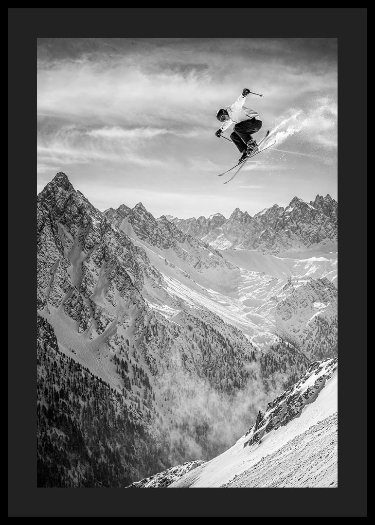 Poster where a skier goes down the mountain-12