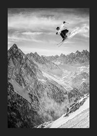 Poster where a skier goes down the mountain-5