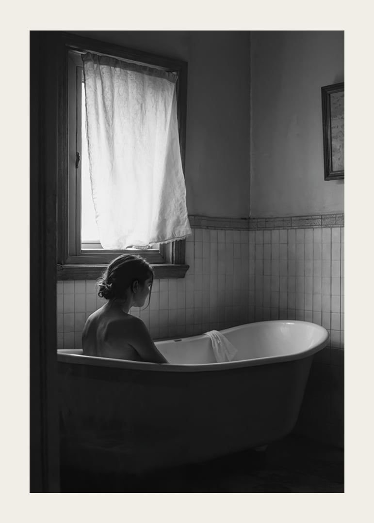 A poster with a woman sitting in her bathtub and thinking-12